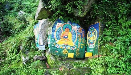 Tibetan paintings on rocks along roadsides in Dalhousie